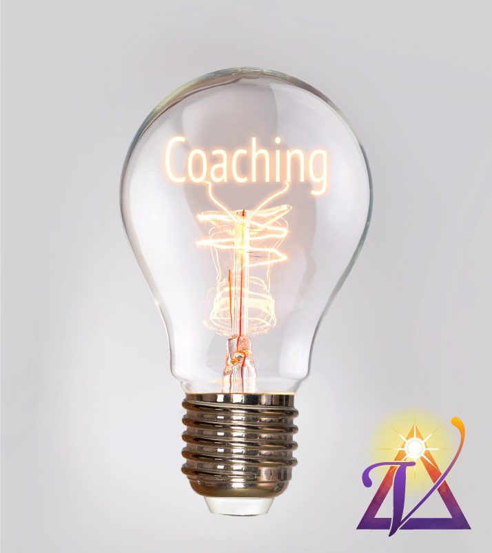 lampara con la palabra coaching adentro, simbolizando inspiracion